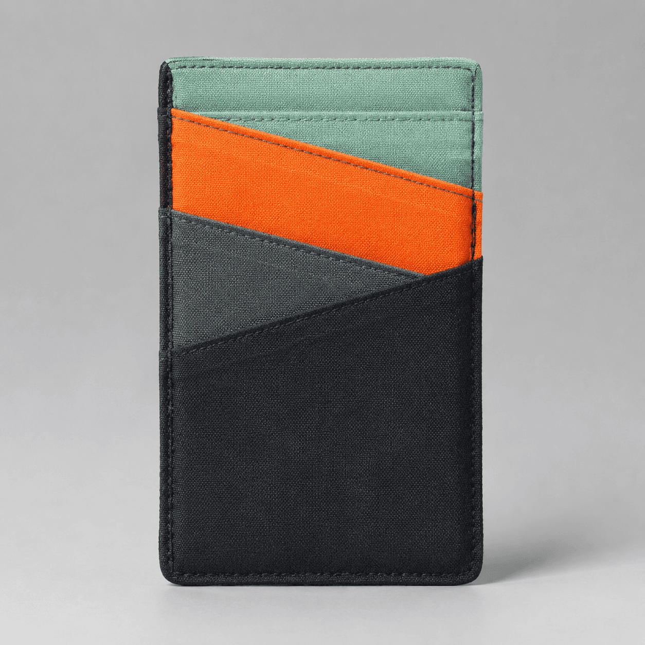 Commuter Receipt Wallet — A flat sleeve that keeps tickets, cards and receipts from crumpling.