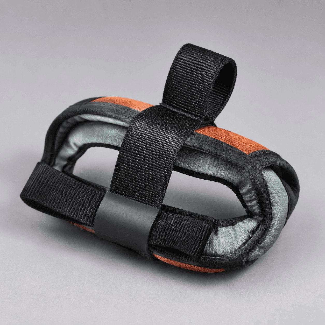 Lock Carry Strap — A padded loop that holds a lock steady while you ride.